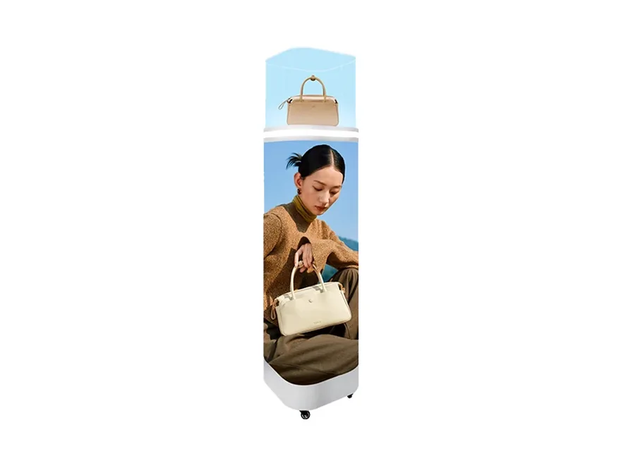 Handbag displayed inside the transparent top showcase of the curved indoor LED display stand in a boutique